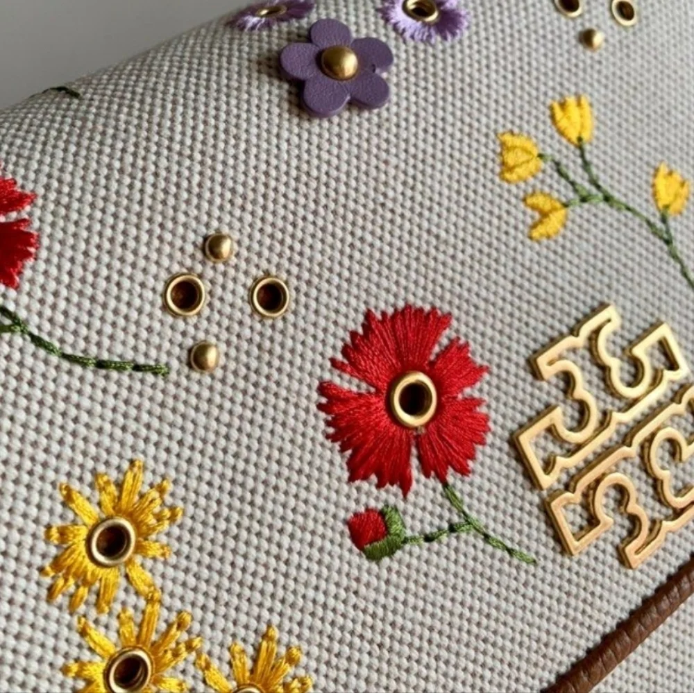 Tory Burch NWOTs Britten Floral Canvas Small Saddle Bag